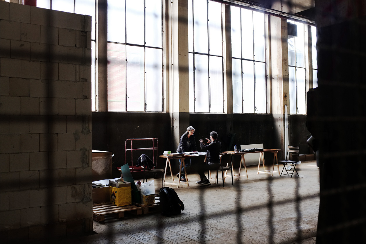 Eva-Maria Kunz and Sam Harris editing at the Photobookmuseum Cologne.